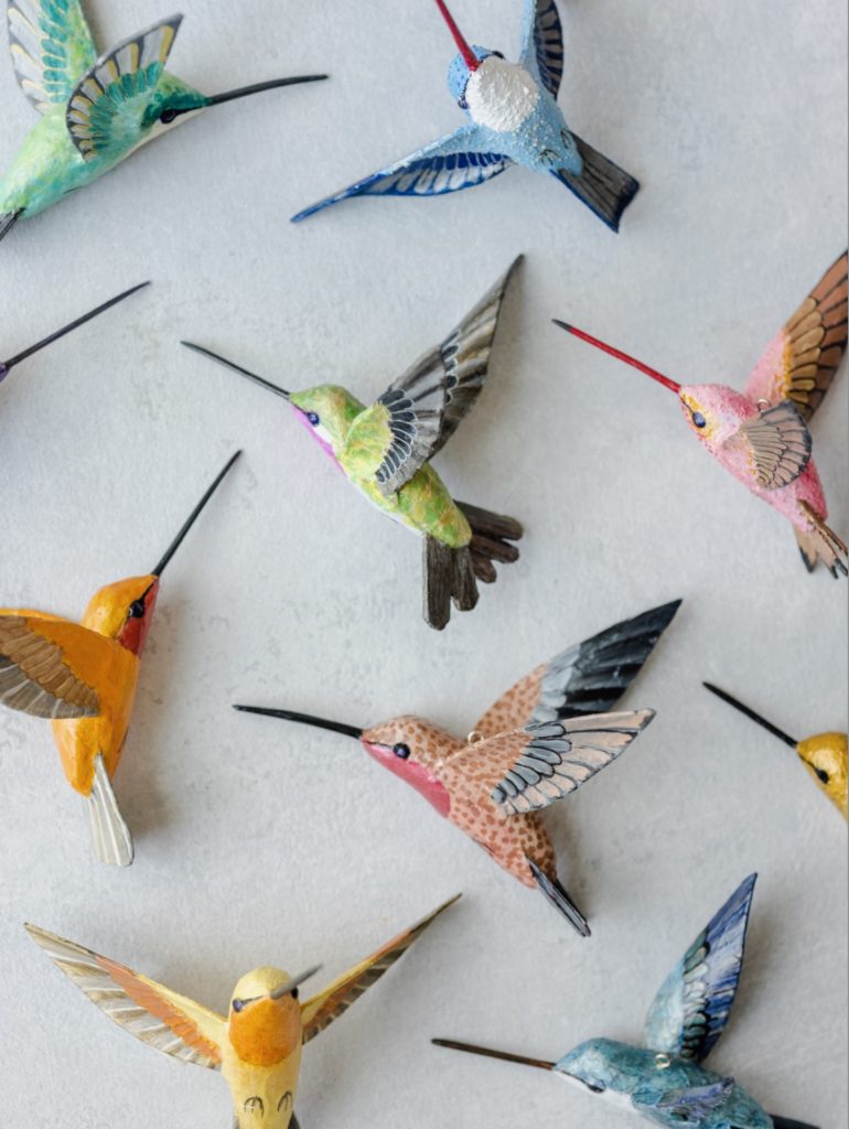 A variety of porcelain hummingbirds on a white background