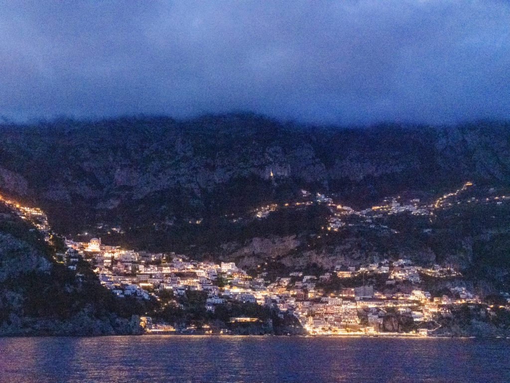 Positano, Italy Lights on the Amalfi Coast from the Mediterranean Sea. 