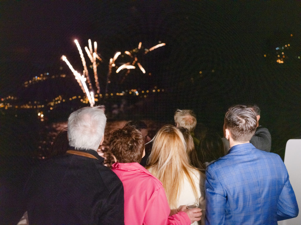 People watching fireworks in Positano, Italy. 