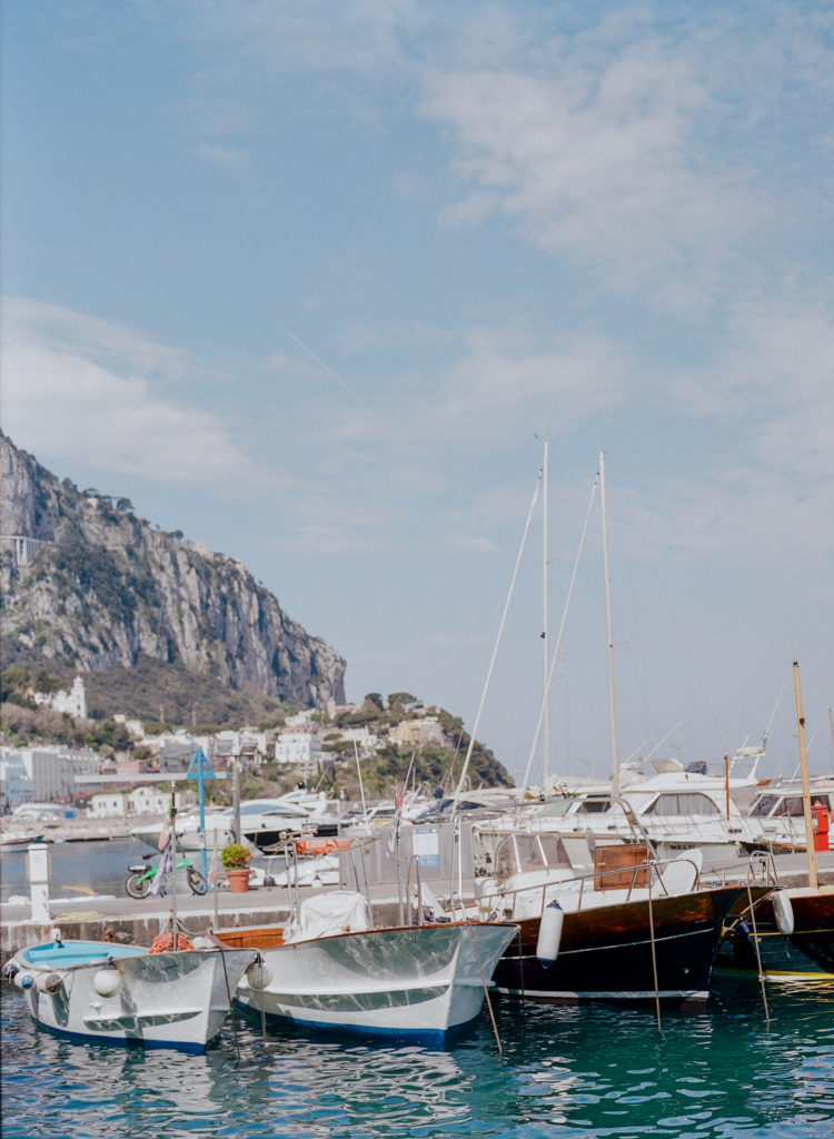 Boats docked in a harbor on Capri, Italy.