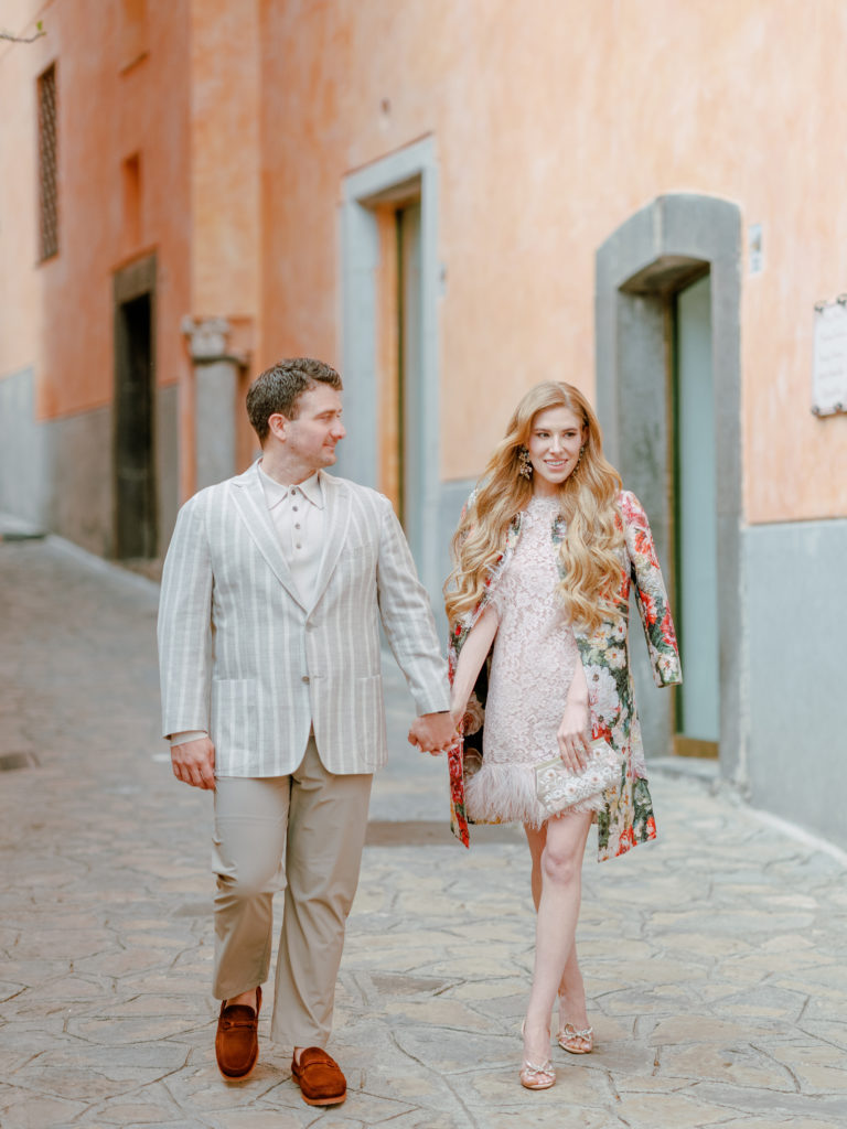 Couple dressed up and walking on the streets of the Amalfi Coast 