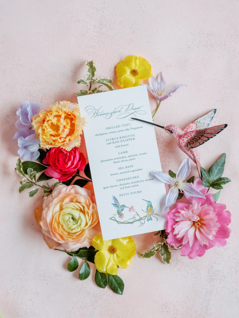Hummingbird Dinner menu card styled with flowers and porcelain hummingbirds