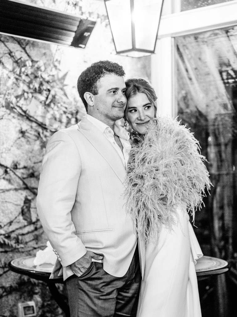 Black and white phots of the engaged couple at their Belmond Caruso rehearsal dinner 