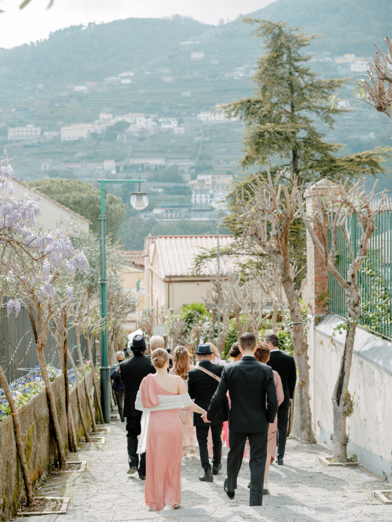 Wedding party walking to the Villa Cimbrone in Italy