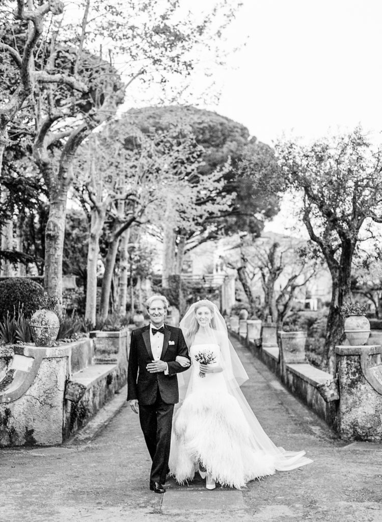 father of the bride walking his daughter down the aisle at the Villa Cimbrone wedding