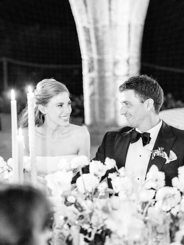 Bride and groom smiling at their Villa Cimbrone wedding reception 